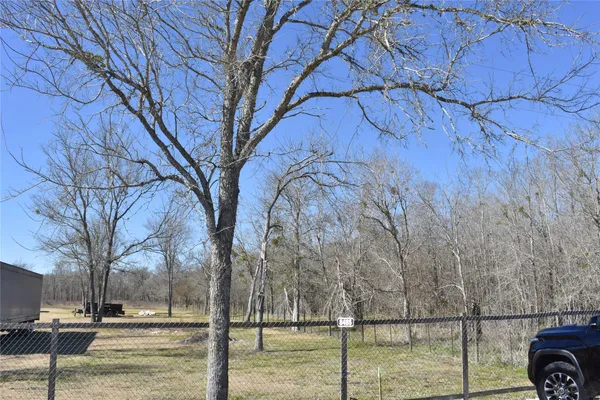 a view of outdoor space with lots of trees