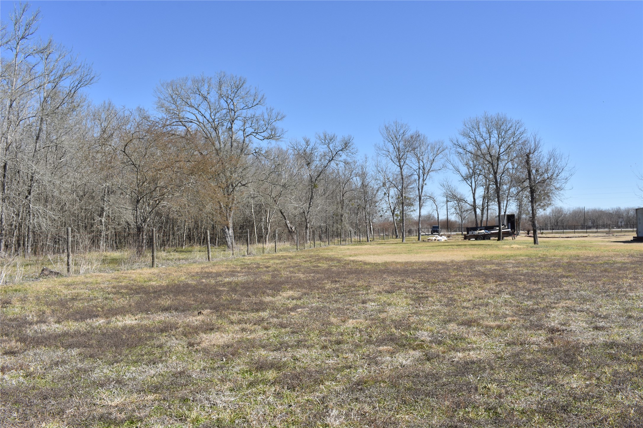 8475 Sunny Side Road Hempstead, TX 77445 - Photo 11 of 15 a view of dirt field with trees