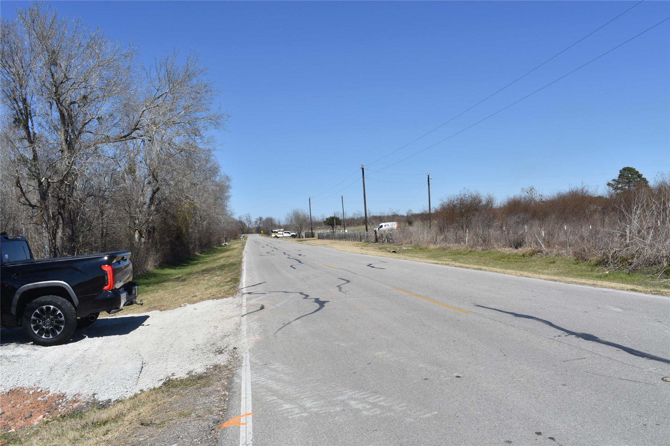 8475 Sunny Side Road Hempstead, TX 77445 - Photo 15 of 15 a view of a yard with car parked