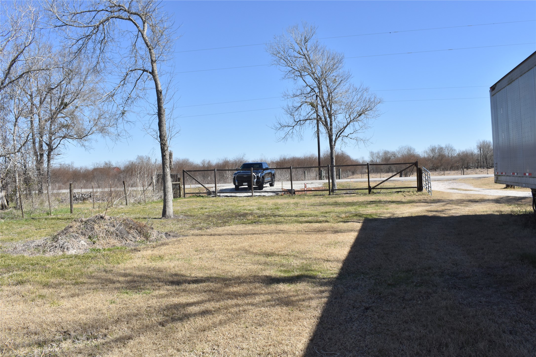 8475 Sunny Side Road Hempstead, TX 77445 - Photo 5 of 15 a view of yard with tree s