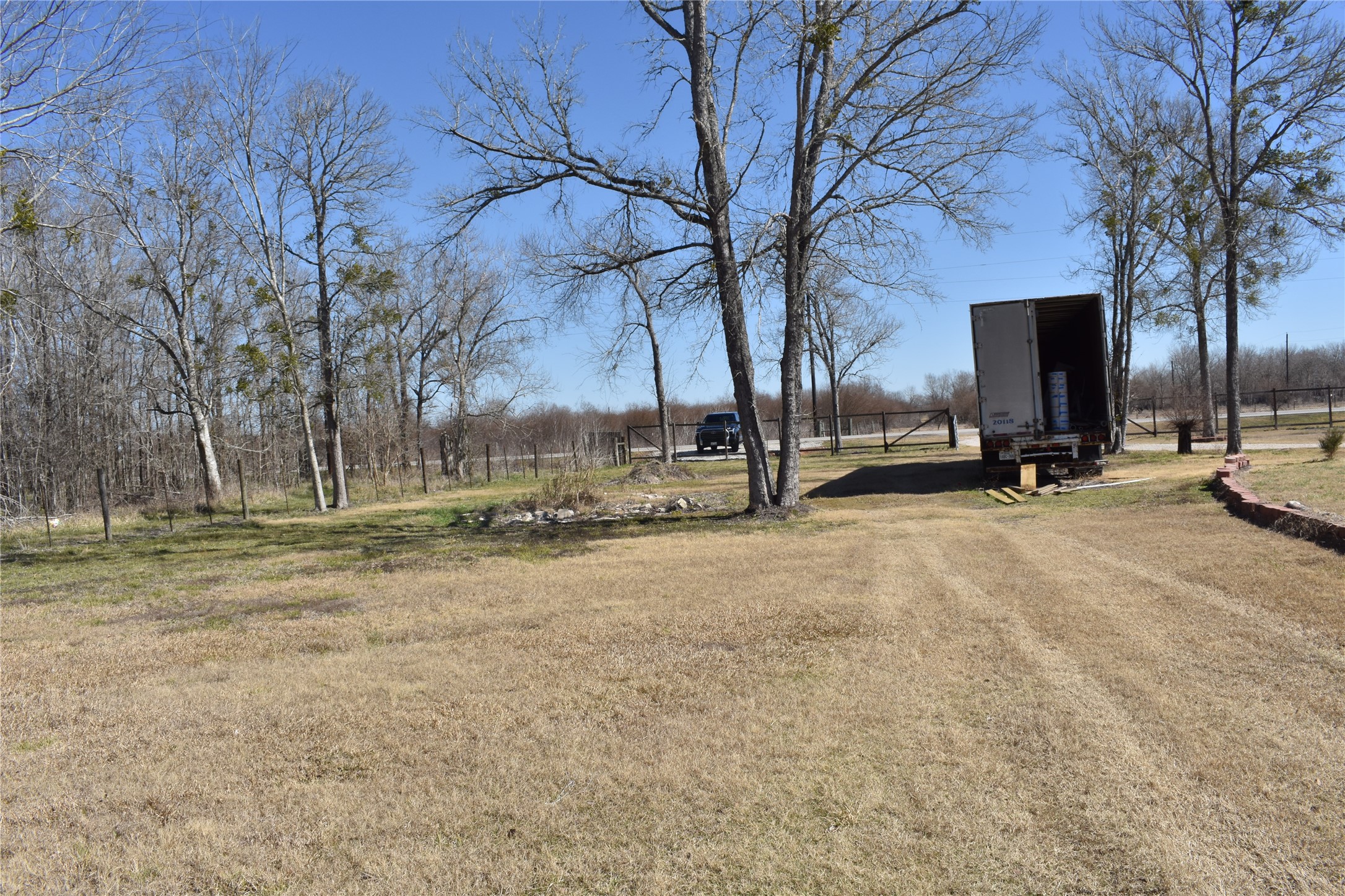 8475 Sunny Side Road Hempstead, TX 77445 - Photo 6 of 15 a view of outdoor space with playground and green space