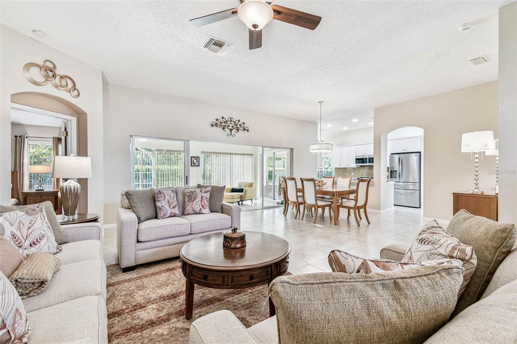 12202 Aaron Terrace Trinity, FL 34655 - Photo 11 of 41 a living room with furniture and a large window