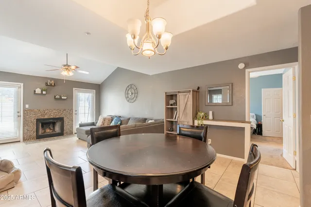 a bedroom with a bed and a chair