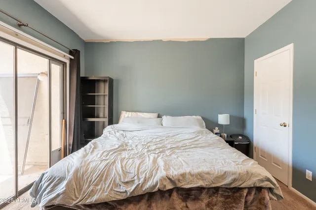 a bathroom with a sink toilet a mirror and shower