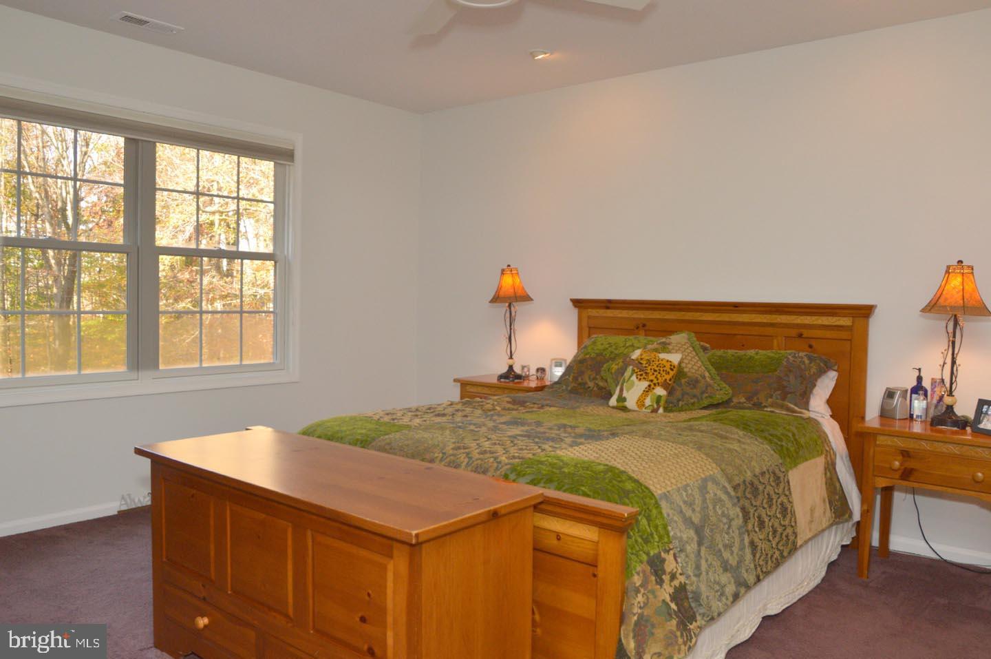 16 Ginger Road Chesterfield, NJ 08515 - Photo 11 of 27 a bedroom with a bed and a window