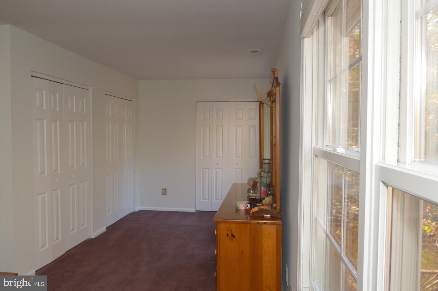 16 Ginger Road Chesterfield, NJ 08515 - Photo 12 of 27 a room with a door and a window