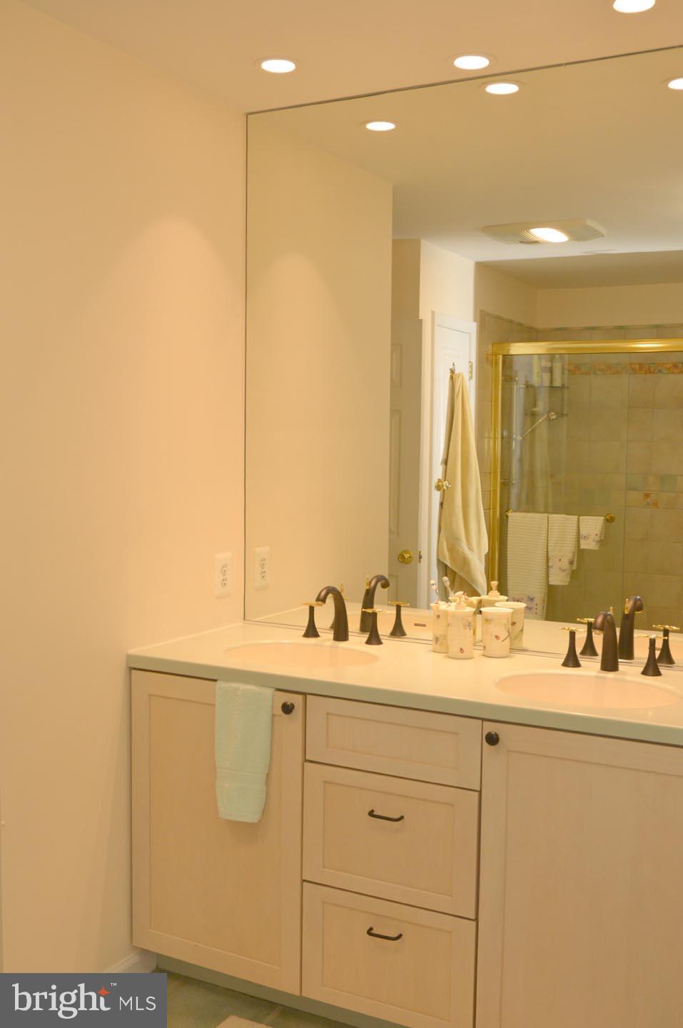 16 Ginger Road Chesterfield, NJ 08515 - Photo 15 of 27 a bathroom with a sink and a mirror