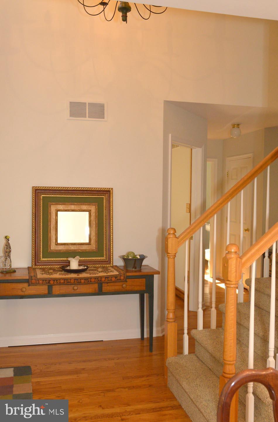 16 Ginger Road Chesterfield, NJ 08515 - Photo 3 of 27 a view of an entryway with wooden floor