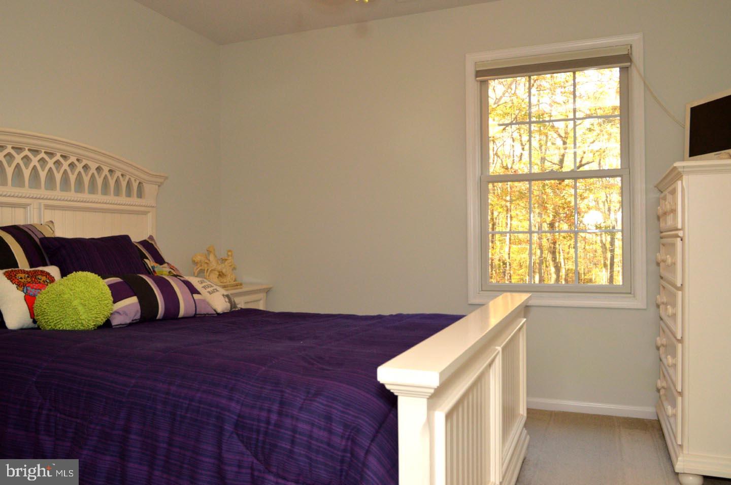 16 Ginger Road Chesterfield, NJ 08515 - Photo 21 of 27 a bedroom with a bed and a window