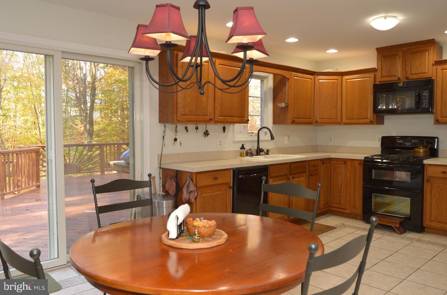 16 Ginger Road Chesterfield, NJ 08515 - Photo 8 of 27 a kitchen with cabinets a sink and appliances