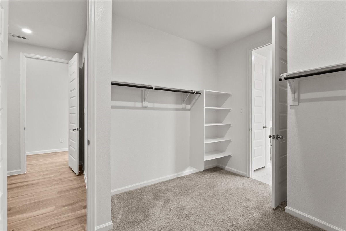 4618 Cooper Lane Rosharon, TX 77583 - Photo 27 of 40 Primary closet connected to utility room!