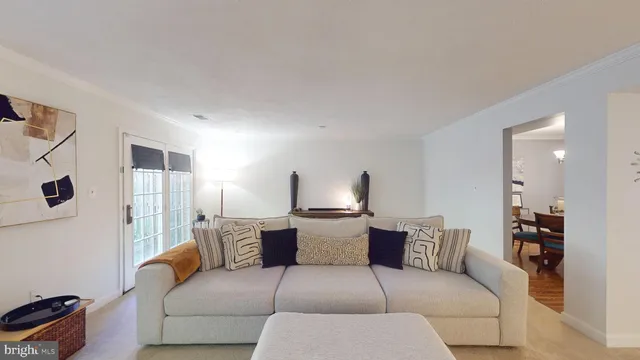 a bedroom with furniture and a flat screen tv