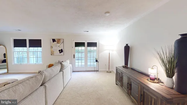 a kitchen with kitchen island a sink stainless steel appliances and cabinets