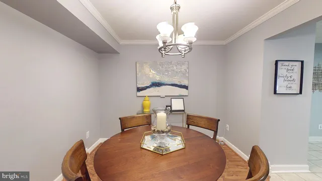 a kitchen with a sink a counter top space and cabinets