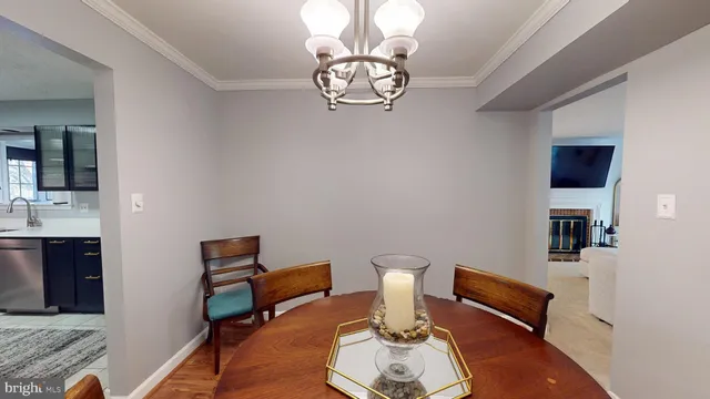 a kitchen with stainless steel appliances a sink stove and refrigerator