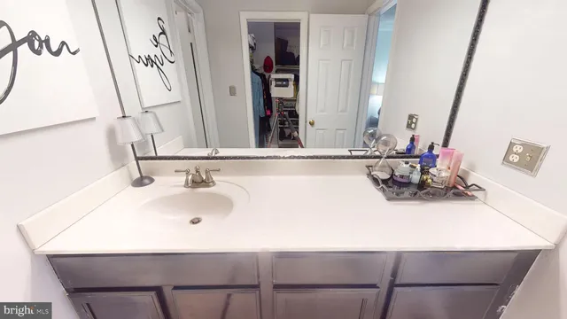 a view of a brick house with a door and a window
