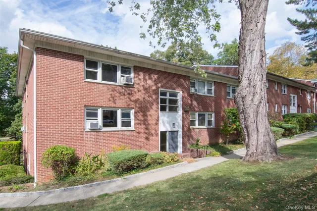 front view of house with a yard
