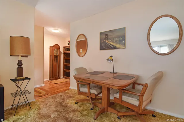 a view of a workspace with furniture