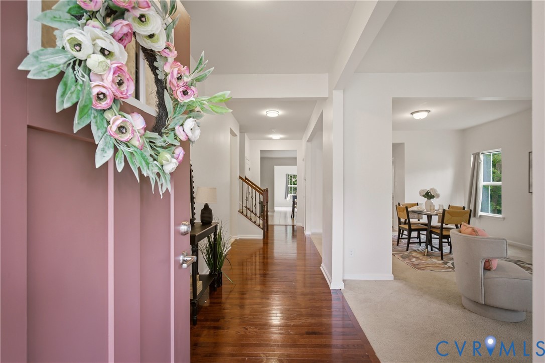 9013 Bailey Hill Road Midlothian, VA 23112 - Photo 4 of 56 Entry foyer featuring wood-finish flooring, a stai