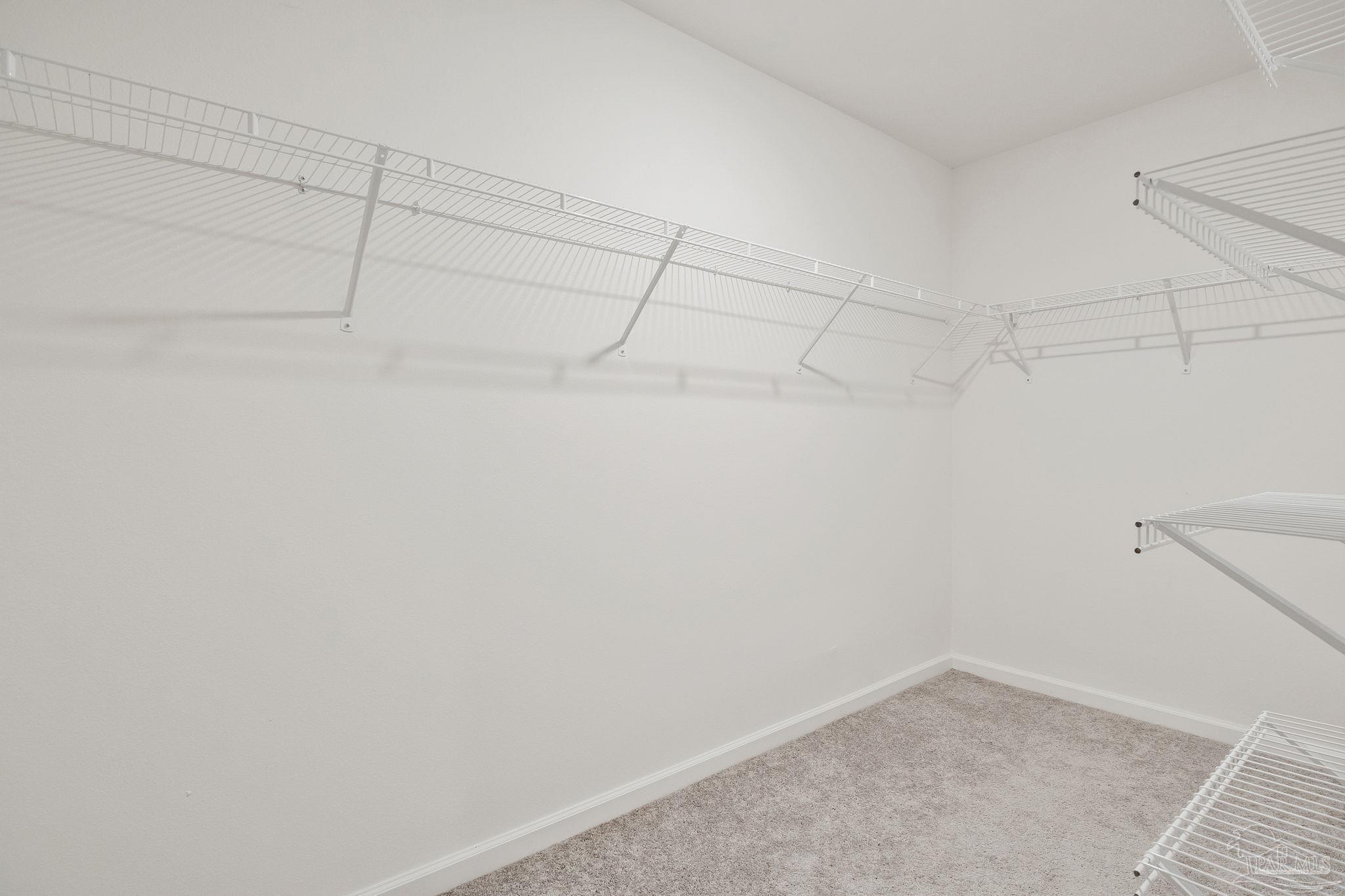 1625 Addies Way Pensacola, FL 32534 - Photo 31 of 50 a view of a room with racks on the wall