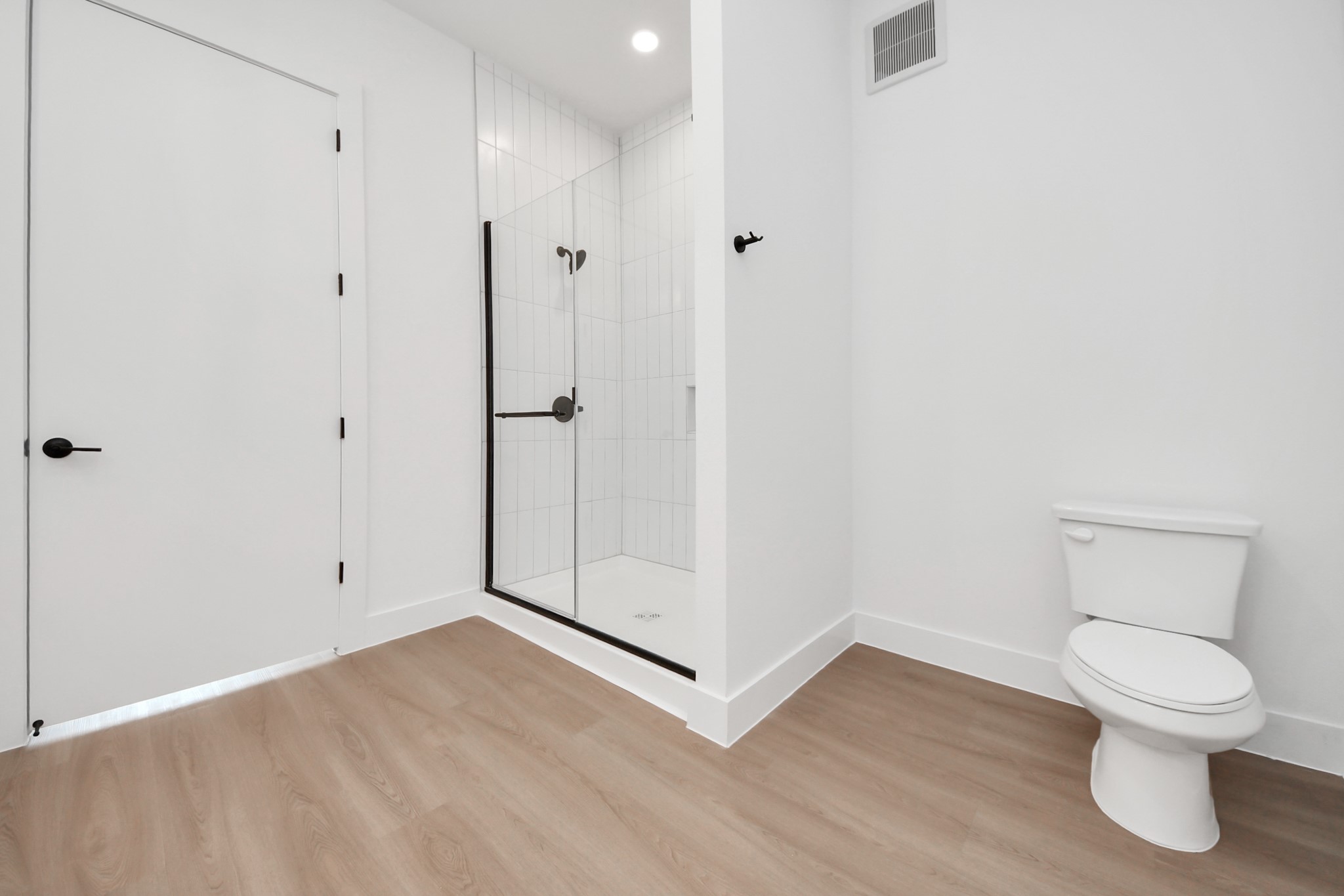 2810 Riverby Road, Unit 225 Houston, TX 77020 - Photo 29 of 47 a bathroom with a toilet and a shower