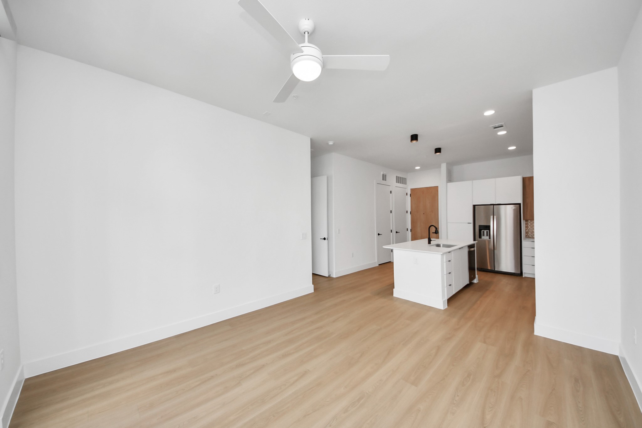2810 Riverby Road, Unit 225 Houston, TX 77020 - Photo 11 of 47 a view of a kitchen with wooden floor