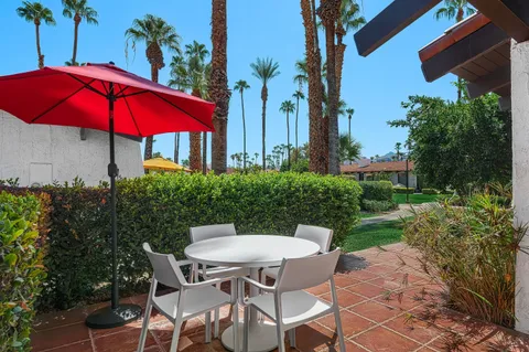 a spacious bedroom with a bed and furniture