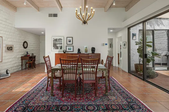 a outdoor living space with patio furniture and a potted plant