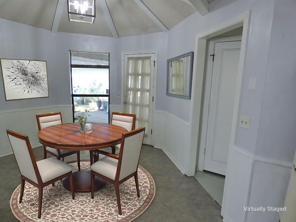1506 East Peters Colony Road Carrollton, TX 75007 - Photo 11 of 33 a dining room with furniture and window
