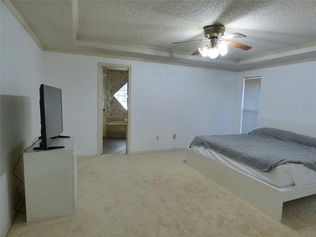 1506 East Peters Colony Road Carrollton, TX 75007 - Photo 14 of 33 a view of a livingroom with a chandelier