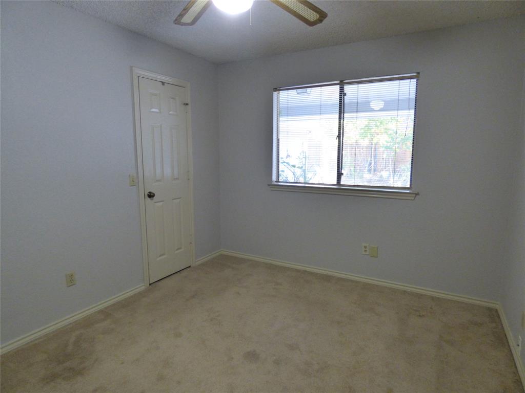 1506 East Peters Colony Road Carrollton, TX 75007 - Photo 25 of 33 an empty room with a window