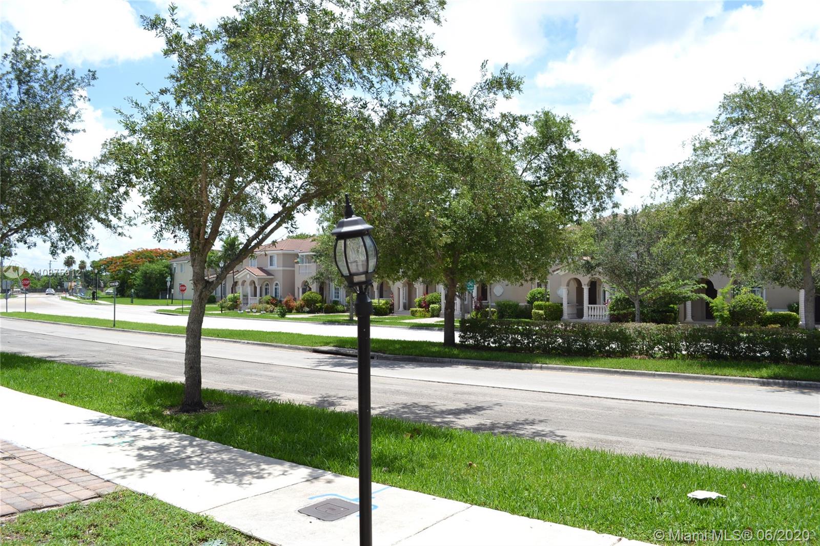 27951 Southwest 140th Avenue Homestead, FL 33032 - Photo 25 of 27 a street sign on the side of the road