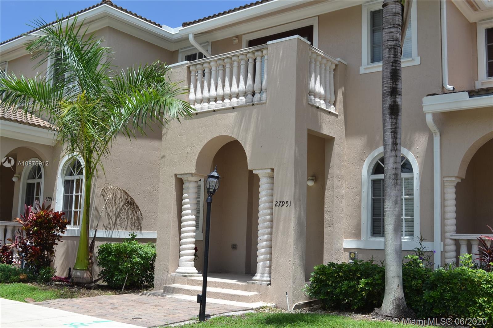 27951 Southwest 140th Avenue Homestead, FL 33032 - Photo 26 of 27 a front view of a house with garden