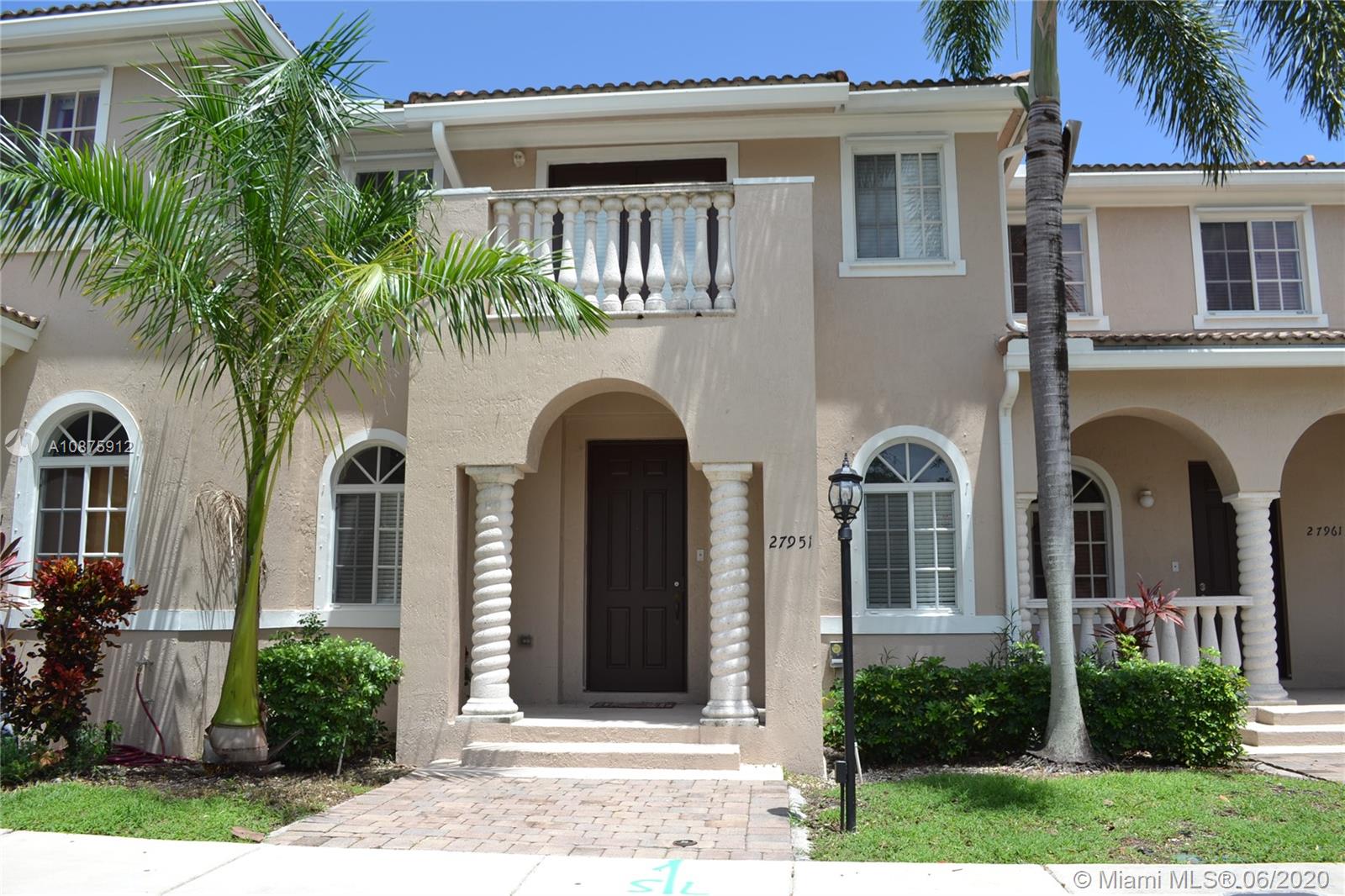 27951 Southwest 140th Avenue Homestead, FL 33032 - Photo 27 of 27 a front view of a house with garden