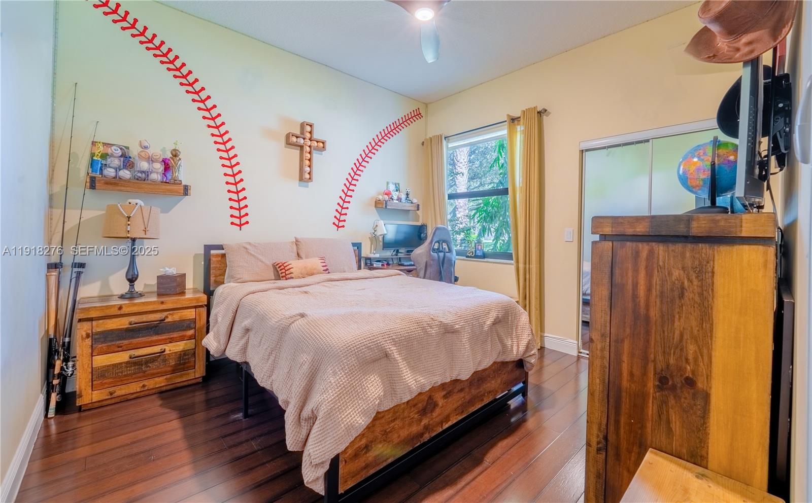 13372 Southwest 40th Street Davie, FL 33330 - Photo 7 of 22 a bedroom with a bed and a large window