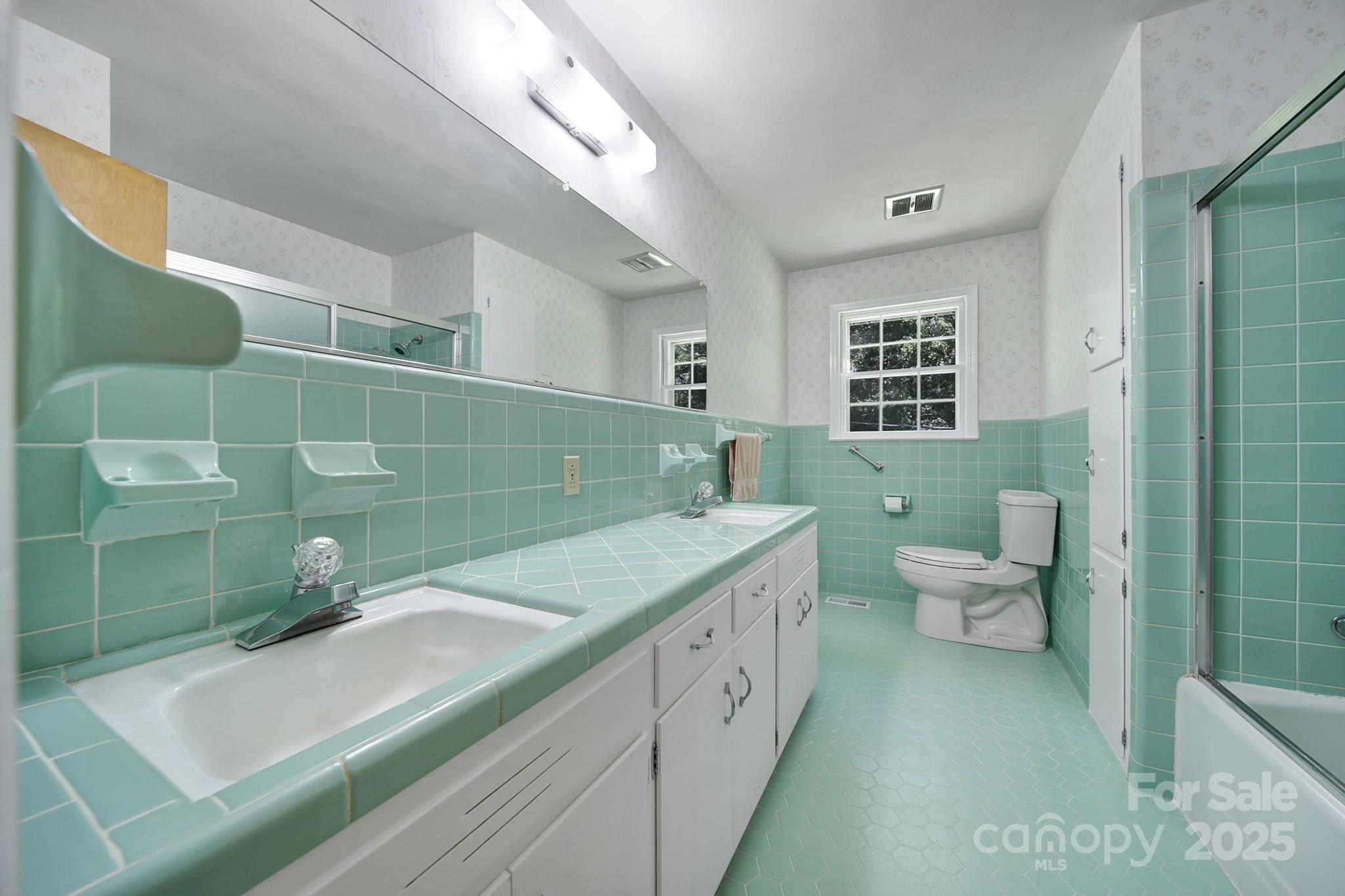967 State Rd S-29-376 Lancaster, SC 29720 - Photo 18 of 33 a bathroom with a granite countertop toilet sink and mirror