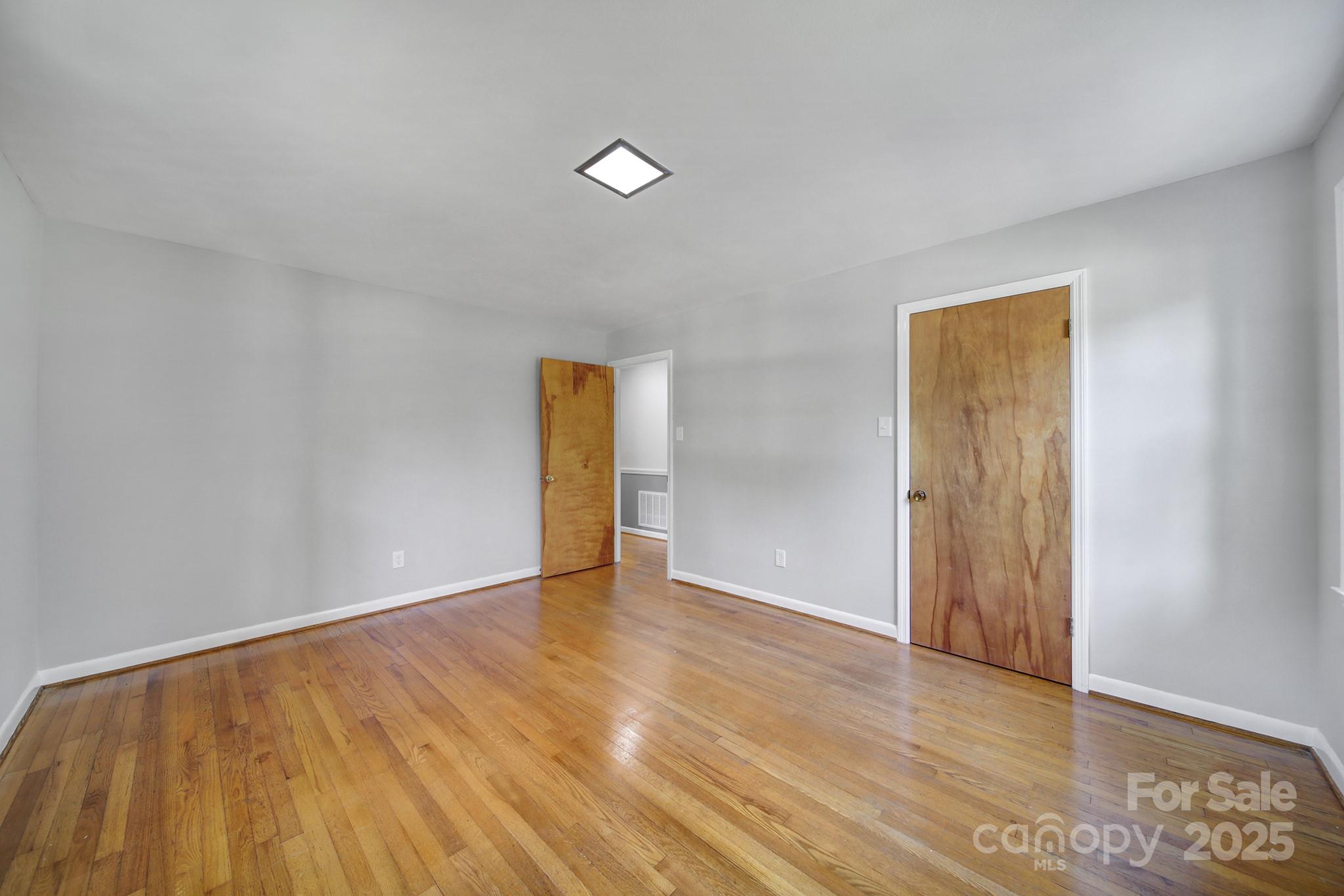 967 State Rd S-29-376 Lancaster, SC 29720 - Photo 20 of 33 a view of an empty room with wooden floor and a window