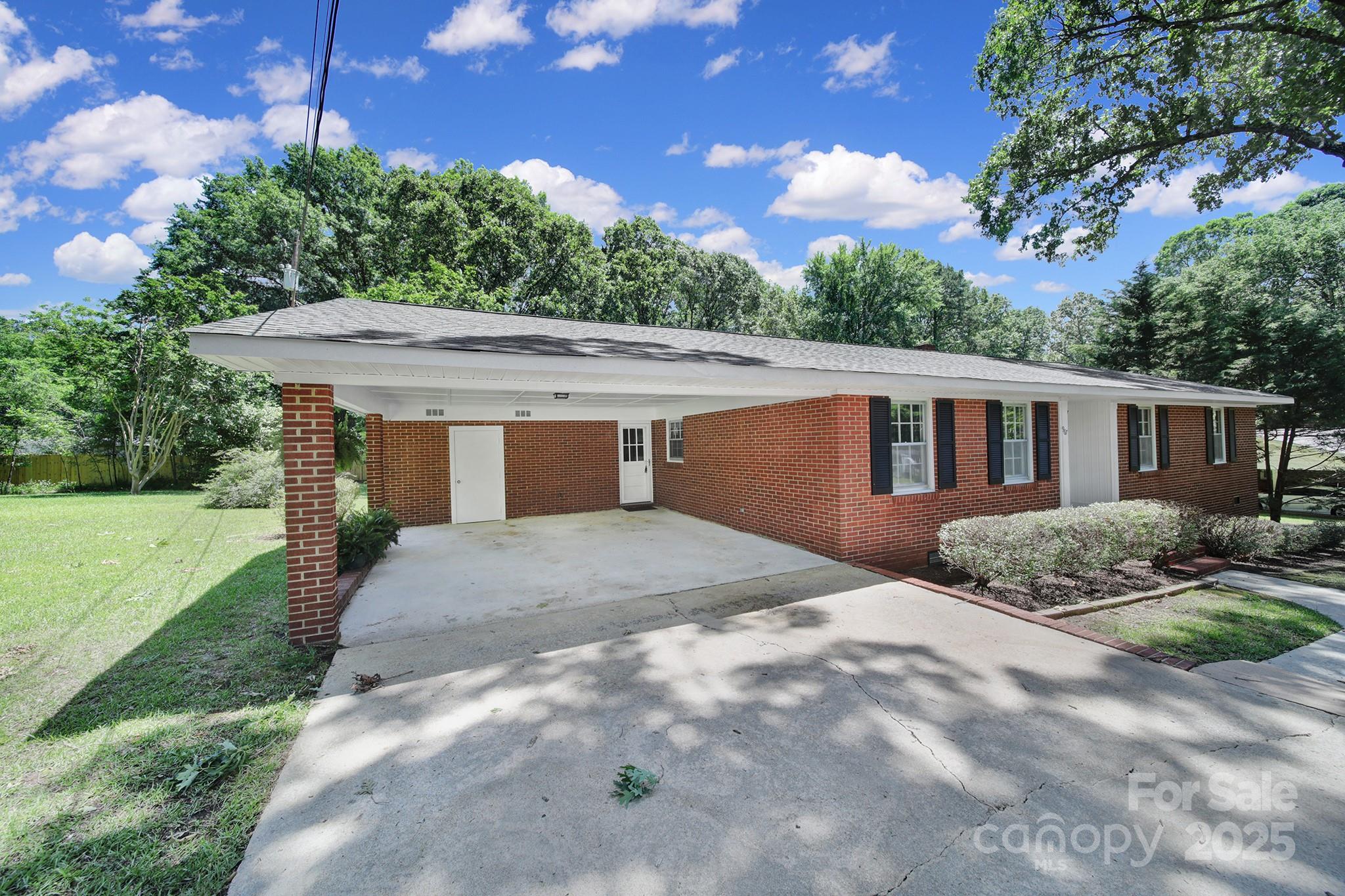 967 State Rd S-29-376 Lancaster, SC 29720 - Photo 2 of 33 a view of a house with a yard