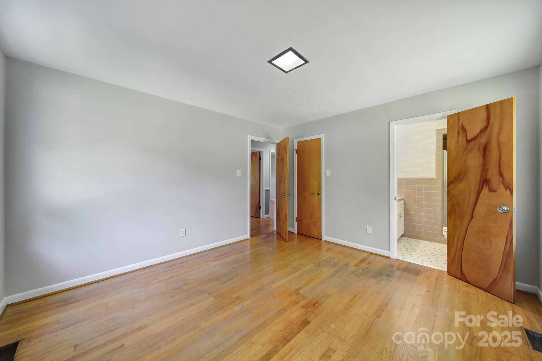 967 State Rd S-29-376 Lancaster, SC 29720 - Photo 21 of 33 a view of an empty room with wooden floor and a window