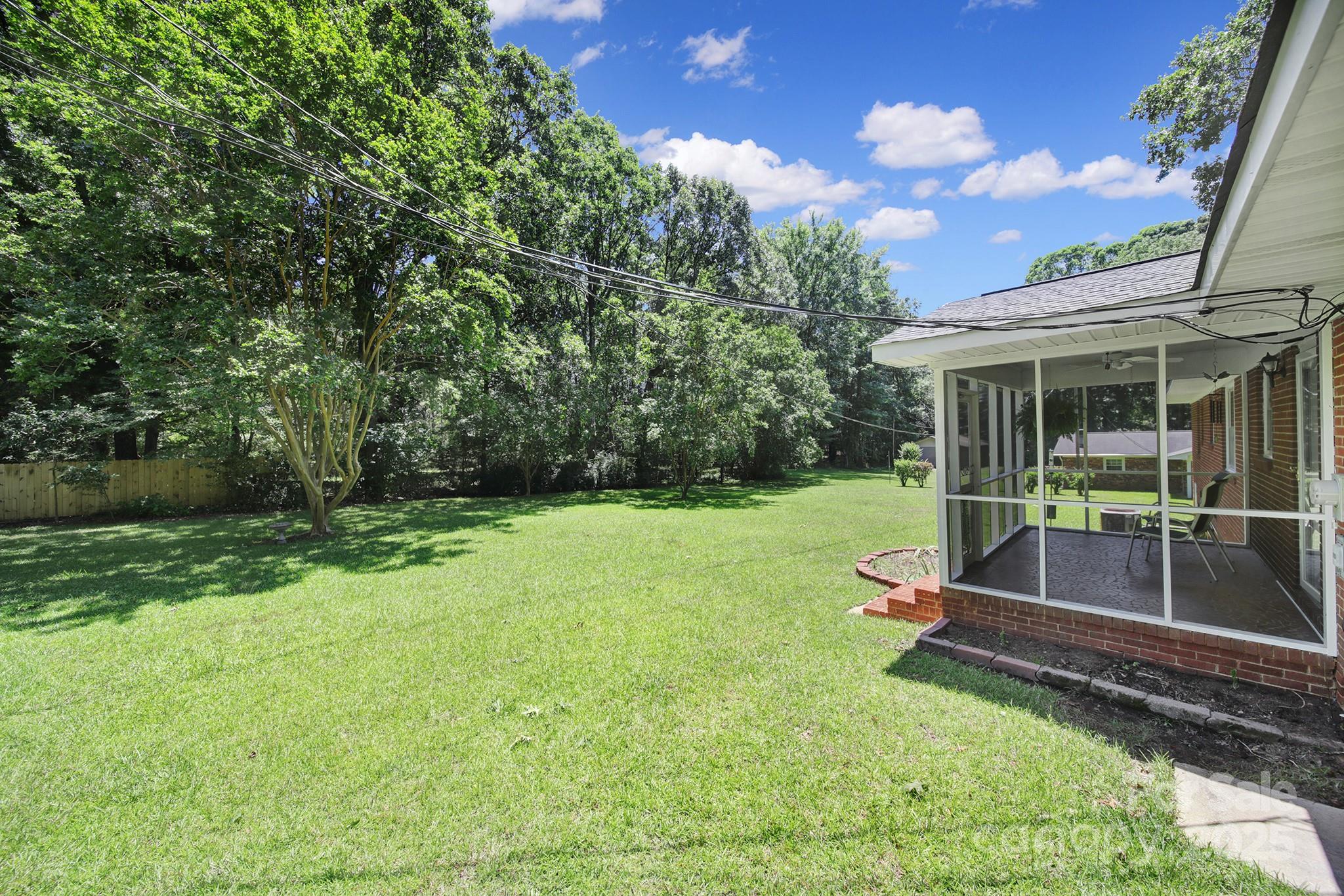 967 State Rd S-29-376 Lancaster, SC 29720 - Photo 28 of 33 a view of backyard with trampoline