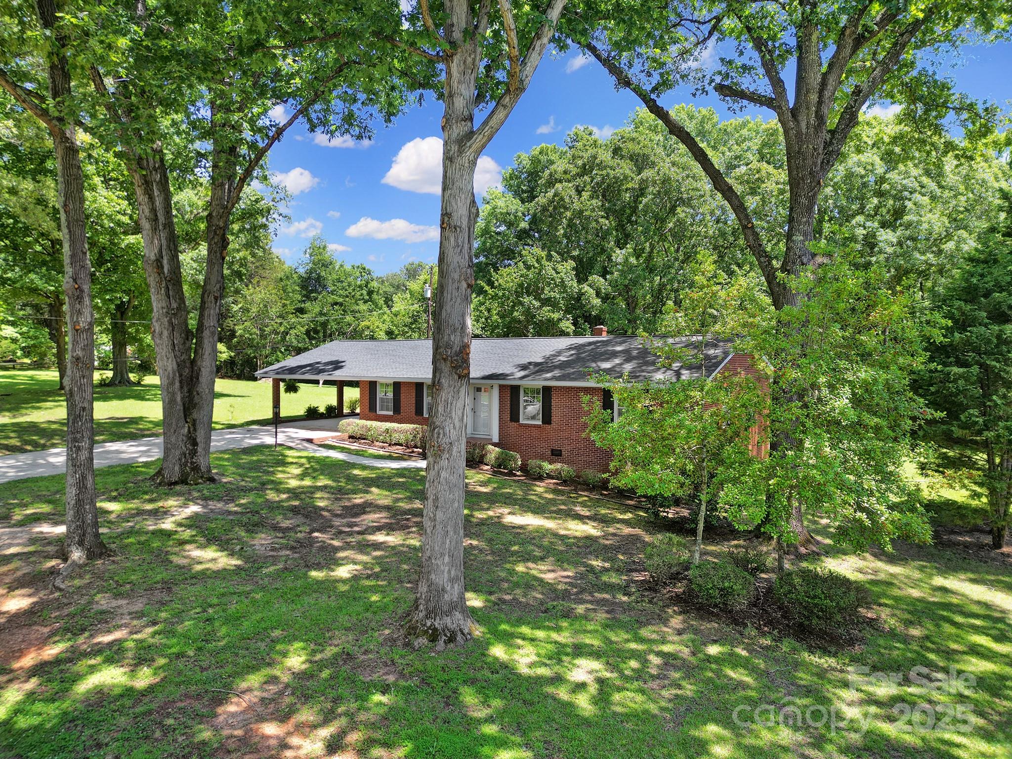 967 State Rd S-29-376 Lancaster, SC 29720 - Photo 33 of 33 a view of a house with a tree in the yard