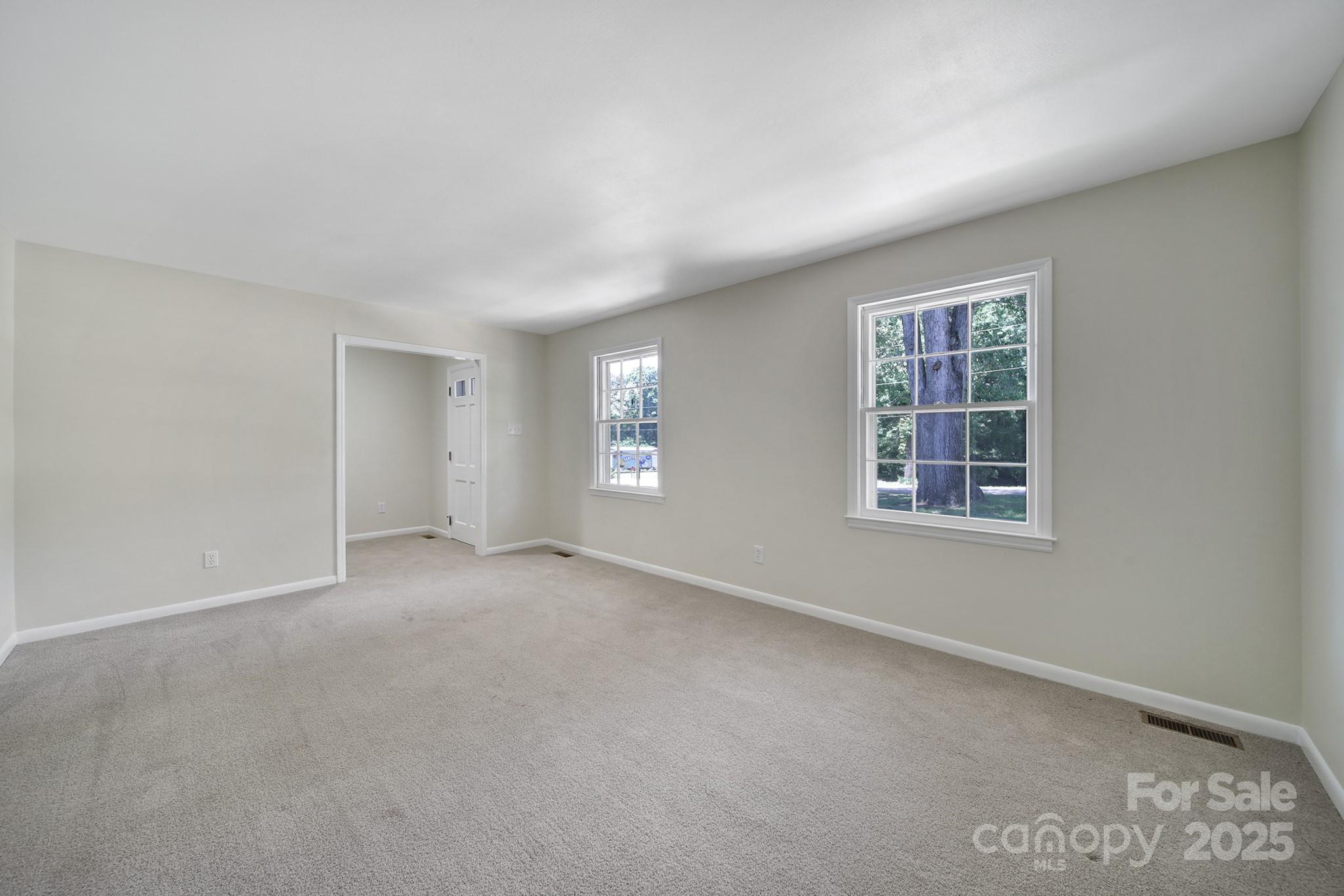 967 State Rd S-29-376 Lancaster, SC 29720 - Photo 7 of 33 an empty room with windows