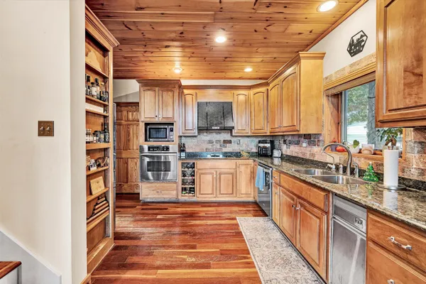 a view of a swimming pool with an outdoor seating