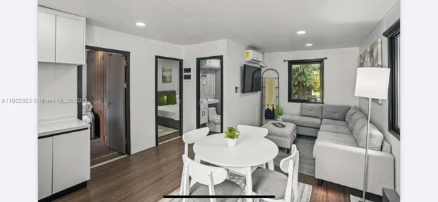 a living room with furniture and a table