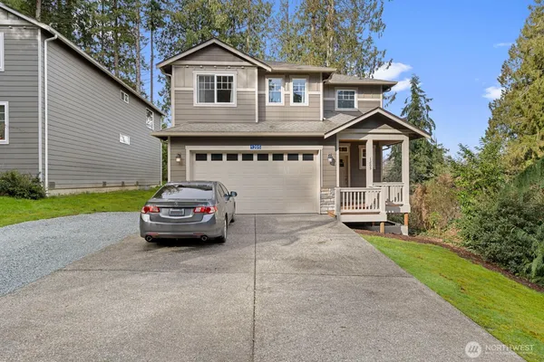 a view of a car in front of house