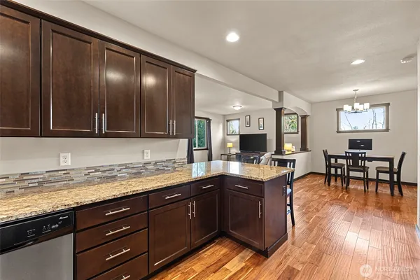 a kitchen with a sink and cabinets