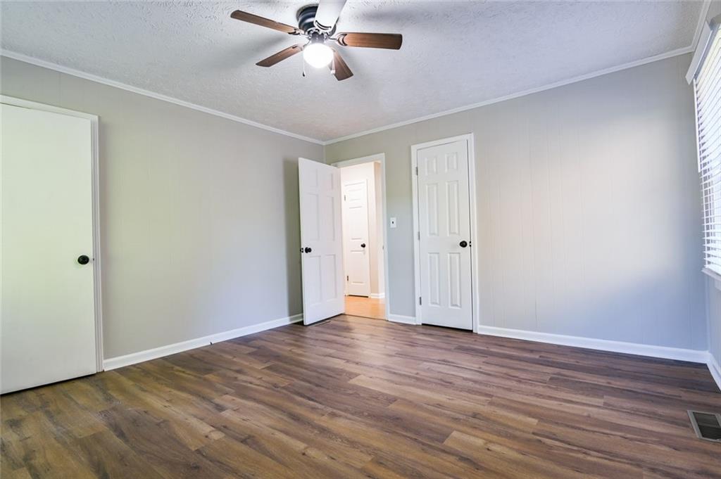 8196 Lakeview Drive Southwest Covington, GA 30014 - Photo 22 of 51 a view of an empty room with wooden floor