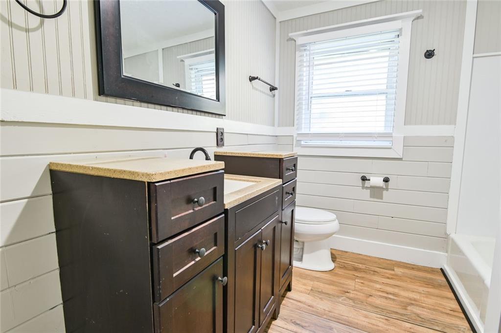 8196 Lakeview Drive Southwest Covington, GA 30014 - Photo 23 of 51 a bathroom with a sink a toilet and a bathtub