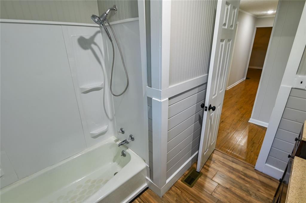 8196 Lakeview Drive Southwest Covington, GA 30014 - Photo 26 of 51 a bathroom with a tub and shower