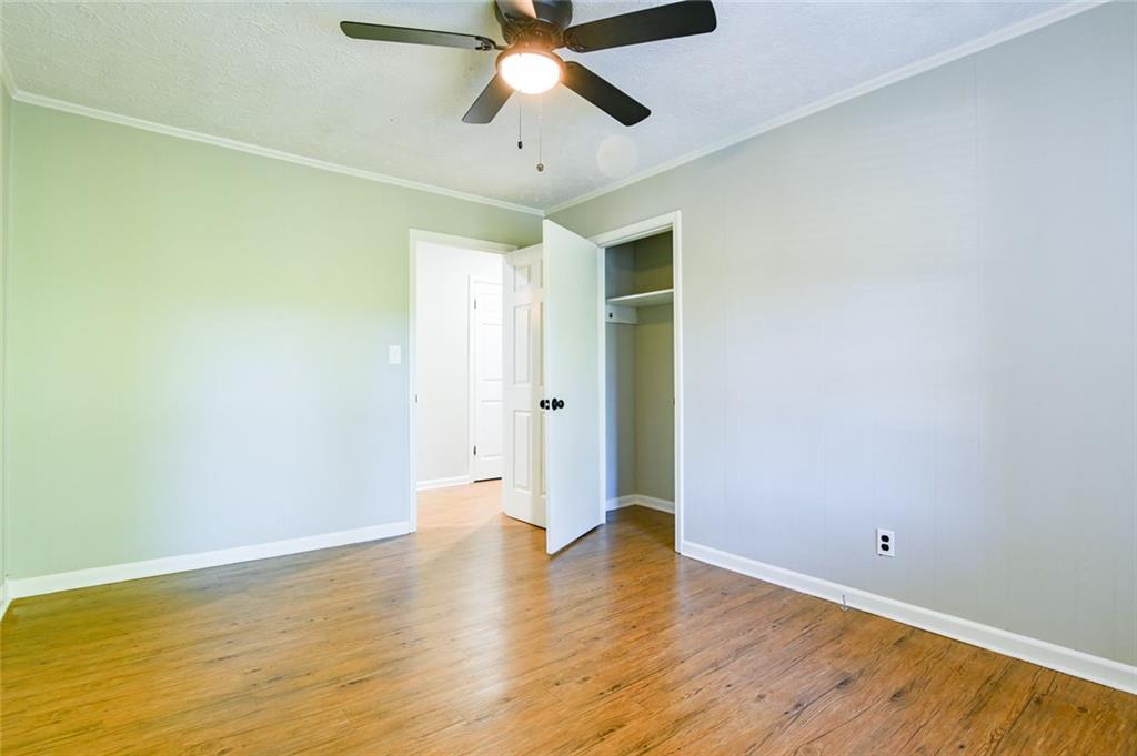 8196 Lakeview Drive Southwest Covington, GA 30014 - Photo 30 of 51 a view of an empty room with wooden floor